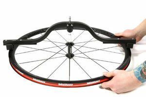 Как выровнять колесо велосипеда